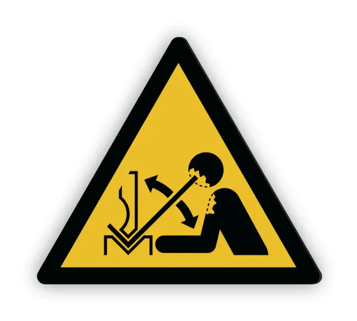 Warnschild „Warnung vor hochschnellendem Werkstück in einer Presse" – W032 nach DIN EN ISO 7010
